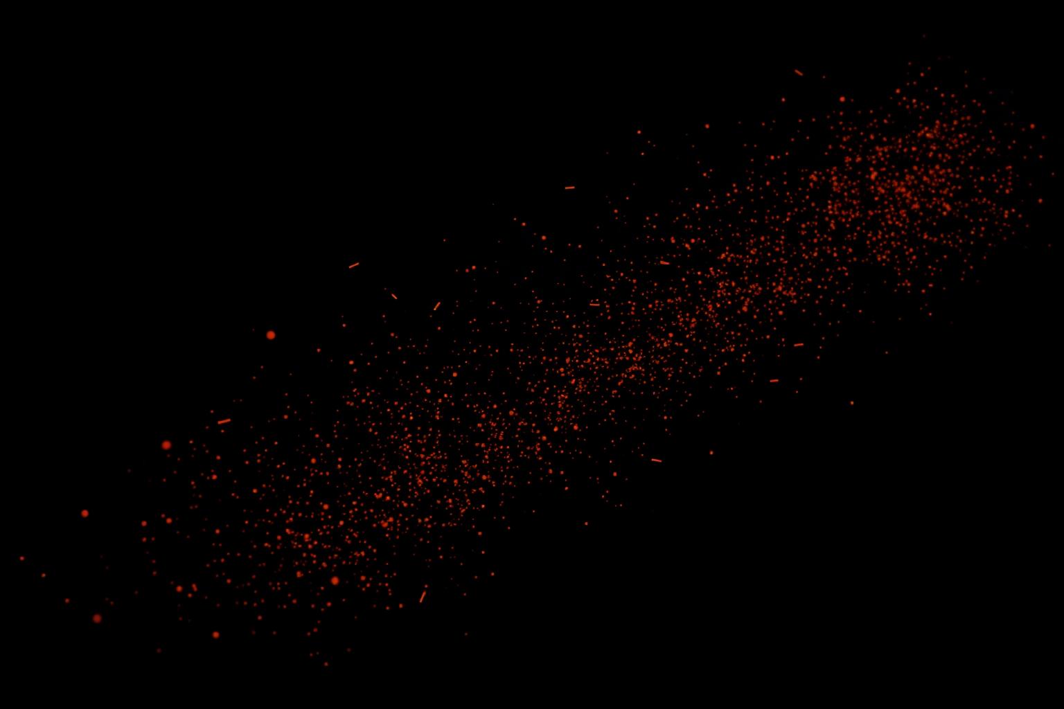 Glowing embers drifting across a dark background